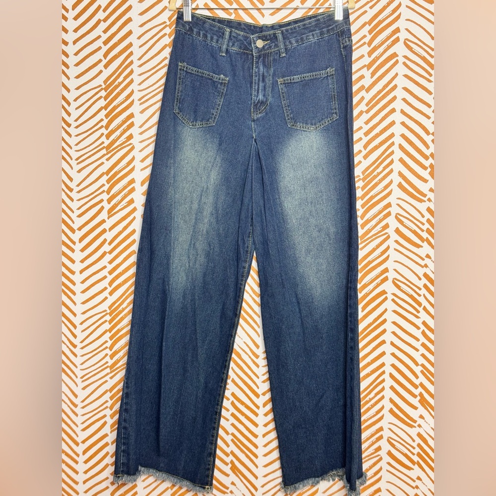 Faded Blue Distressed Boot Cut Jeans